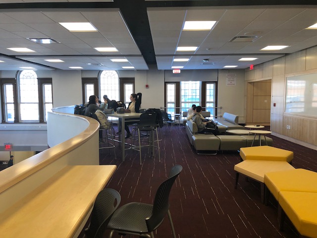 Mezzanine with desks, tables and couches