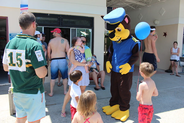 Kids line up to meet a character from a popular kids TV show Paw Patrol