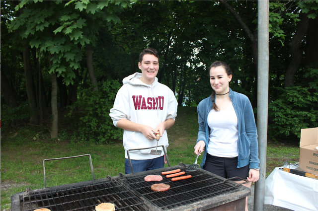 Blake Siegel and Hannah Lewis barbecuing 