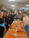 Volunteers at WRT Cook Thanksgiving Dinners for Those in Need